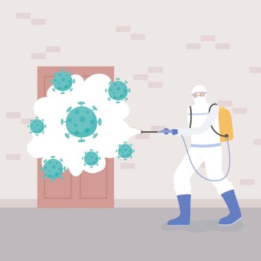 Virüs dezenfeksiyonu, koruyucu giysi giyen bir adam, koronavirüs hücrelerini temizleme ve dezenfekte etme, önleyici tedbir.