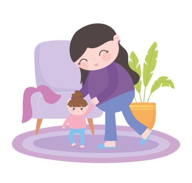 Hamilelik ve annelik. Anne, küçük kızıyla odada oynuyor.