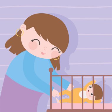 Hamilelik ve annelik, bebeği beşikte olan tatlı bir anne.