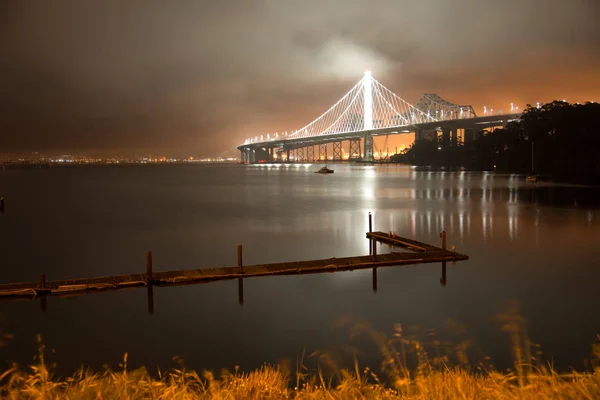 View of the Bay Bridge lit up at night, San Francisco, North Beach, California, USA