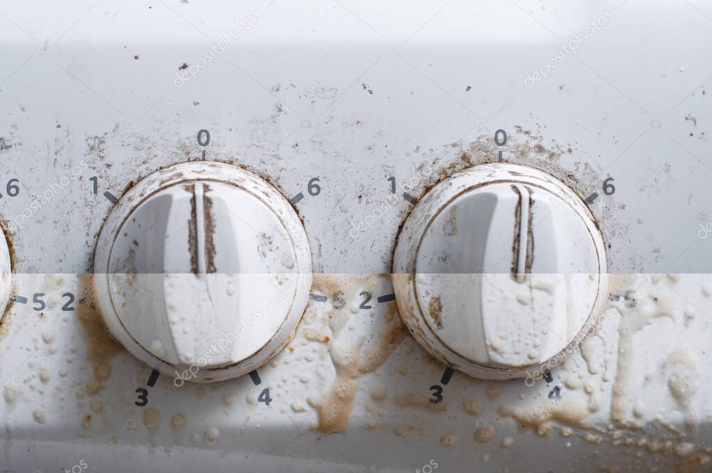 The process of washing the front panel of the electric stove from stubborn dirt, before and after applying the detergent
