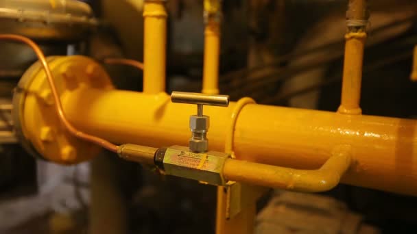 Yellow gas pipes in the boiler room — Stock Footage Yellow Gas Pipes Boiler Room Stock Footage
