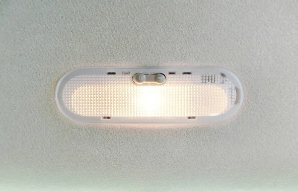 Car ceiling light with turned on.