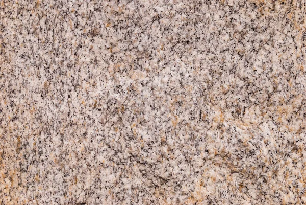 Natural light granite stone in fine speckles.