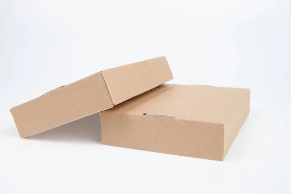 Empty brown cardboard paper box isolated on white background — Stock Photo, Image