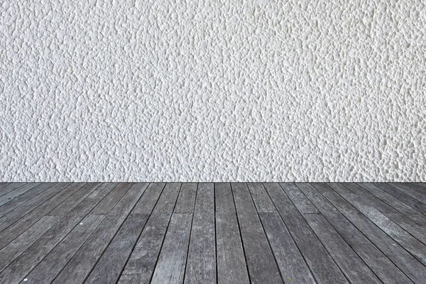 Fond de mur de ciment blanc sur plancher de bois — Photo