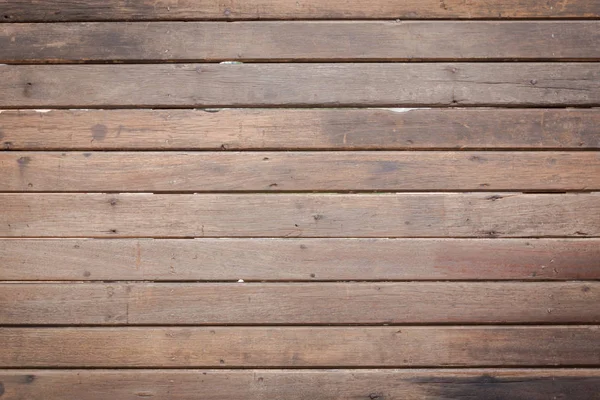Primo piano della parete fatta di assi di legno — Foto Stock
