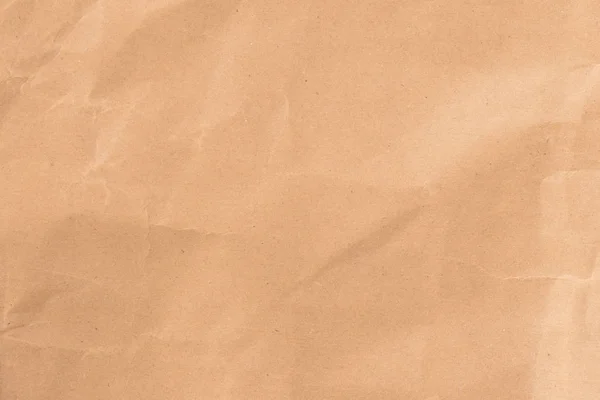 Paper texture - brown crumpled paper sheet. — Stock Photo, Image