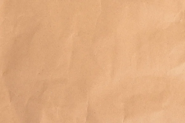 Paper texture - brown crumpled paper sheet. — Stock Photo, Image