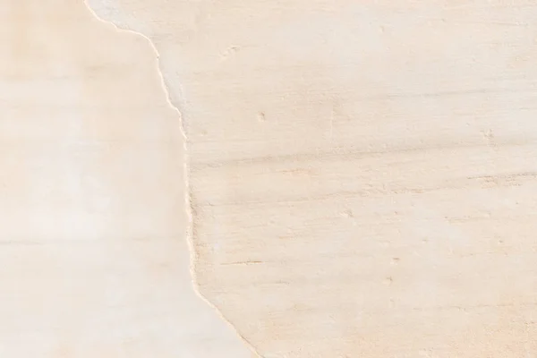 ひびの入ったベージュ大理石です テクスチャ背景 — ストック写真