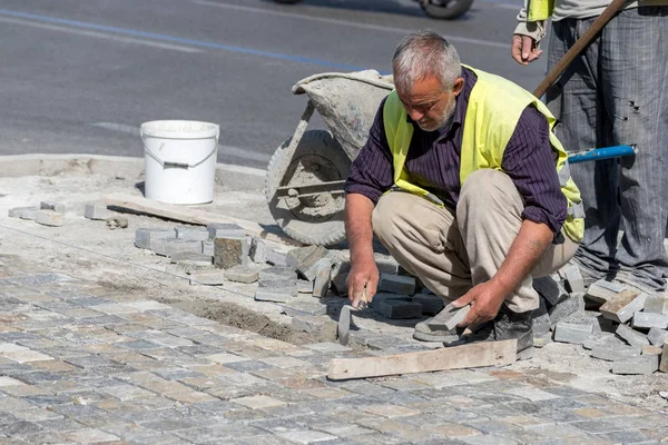 Athens Greece March 2018 Construction Worker Installing Stone Blocks Street — Stock Photo, Image