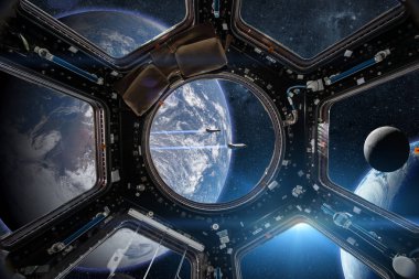 View from a porthole of space station on the Earth background. Elements of this image furnished by NASA. clipart