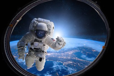 Astronaut in outer space from porthole on background of the Earth. Elements of this image furnished by NASA. clipart