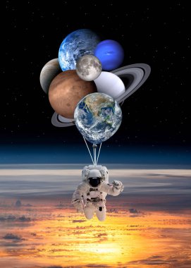 Astronot uzay adamı gezegenler ile güneş sisteminde balon şeklinde. Nasa tarafından döşenmiş bu görüntü unsurları.