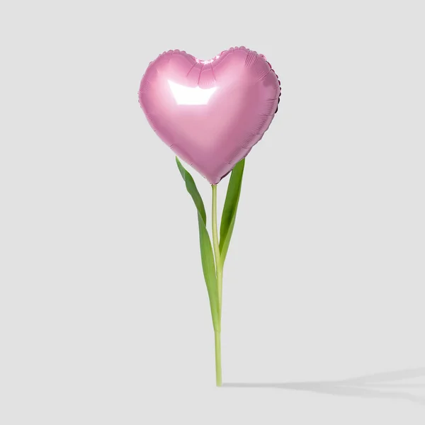 Globo de corazón rosa sobre un tallo de flores sobre fondo brillante. Concepto de amor mínimo . —  Fotos de Stock