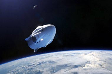 Alçak Dünya yörüngesinde kargo uzay aracı. Bu görüntünün elementleri NASA tarafından desteklenmektedir.