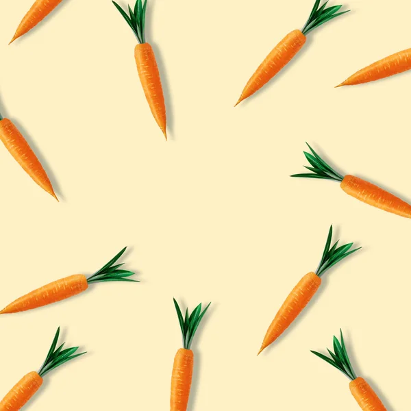 Творчий великодній візерунок, зроблений з моркви на жовтому тлі. Мінімальна Великодня композиція. Плоский шар . — стокове фото