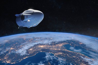 Alçak Dünya yörüngesinde kargo uzay aracı. Bu görüntünün elementleri NASA tarafından desteklenmektedir.