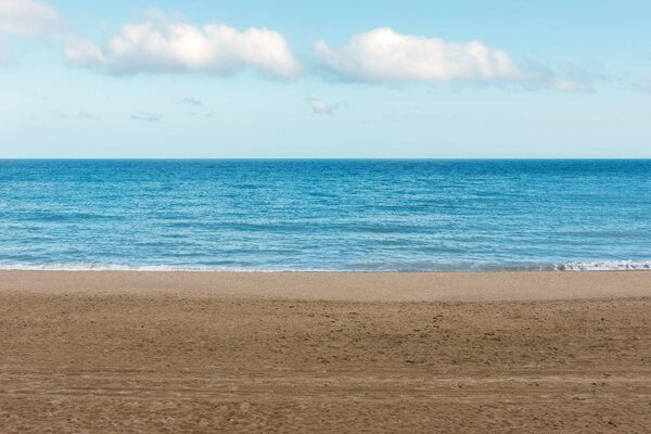 Beautiful sandy beach on sea background. Summer concept.