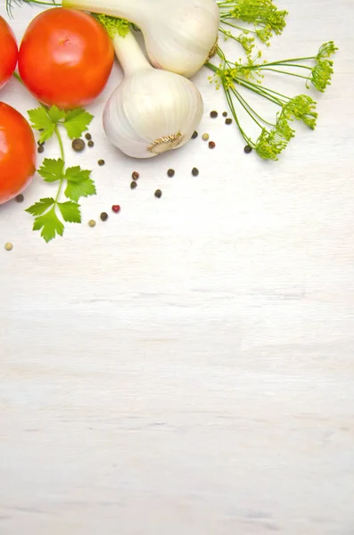 menu background, parsley leaves garlic and onion and dill pepper peas on wooden white background