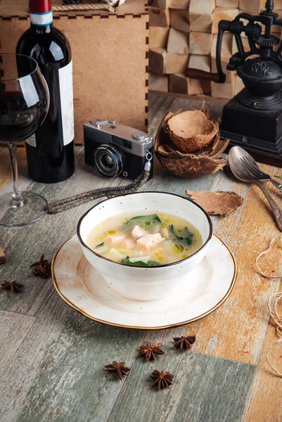 Delicious gourmet salmon and spinach soup — Stock Image Delicious gourmet salmon and spinach soup Stock Photo