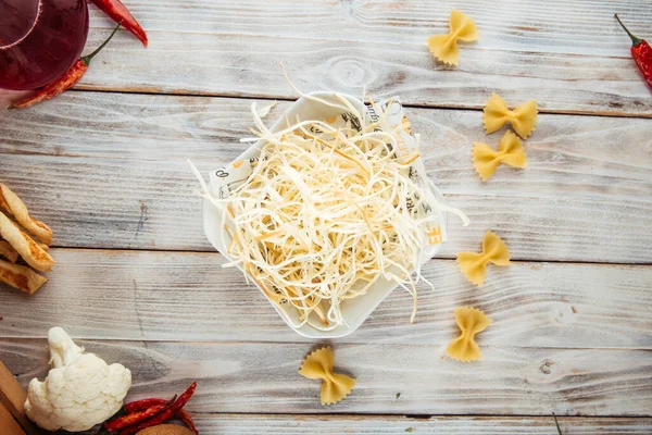 Top view on fiber smoked cheese chechil in a bowl — Photo