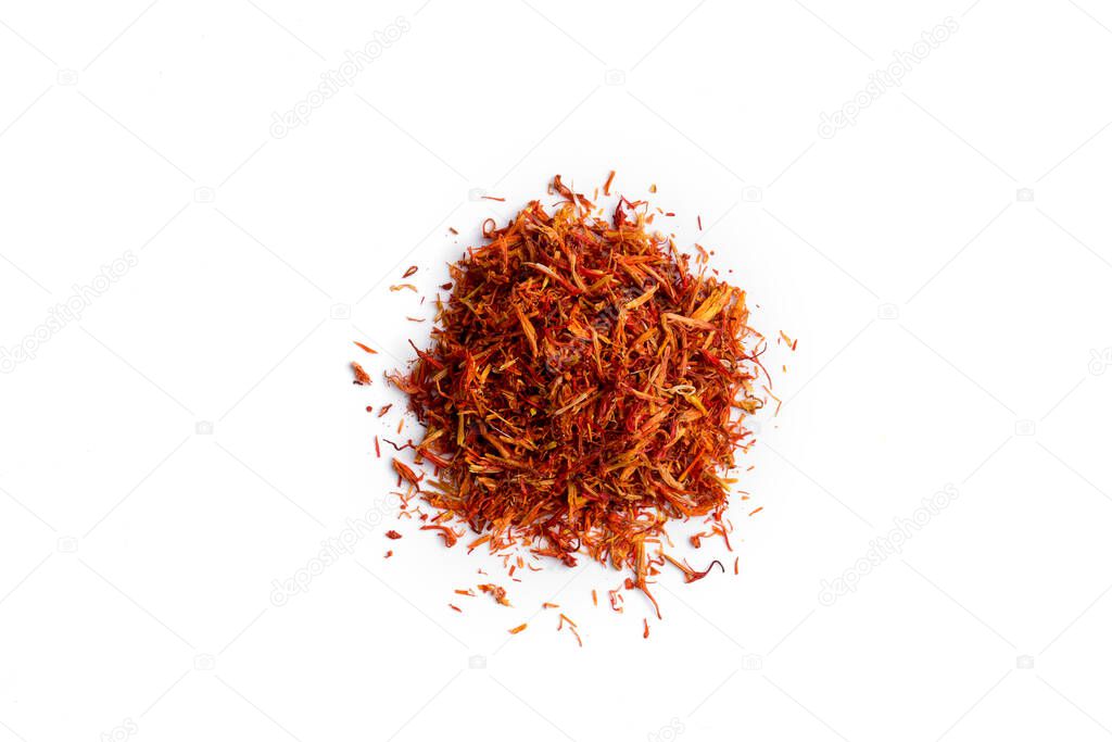 Isolated heap of dried spice saffron 