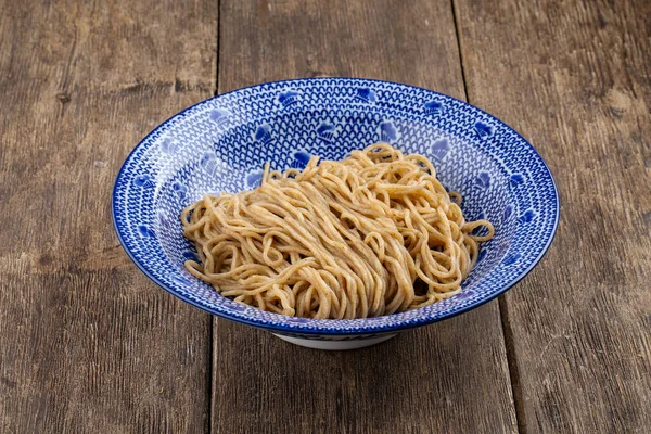 Homemade egg noodles in asian traditional bowl — Stock Photo, Image