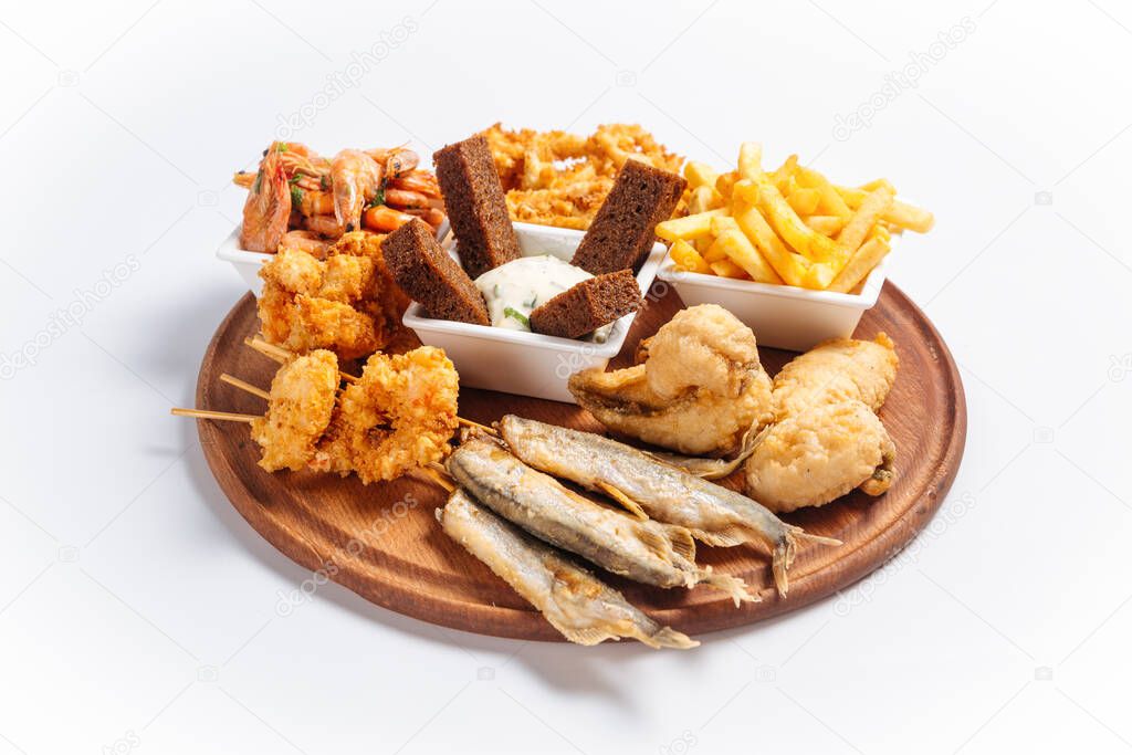 Isolated seafood beer platter with fish and shrimp