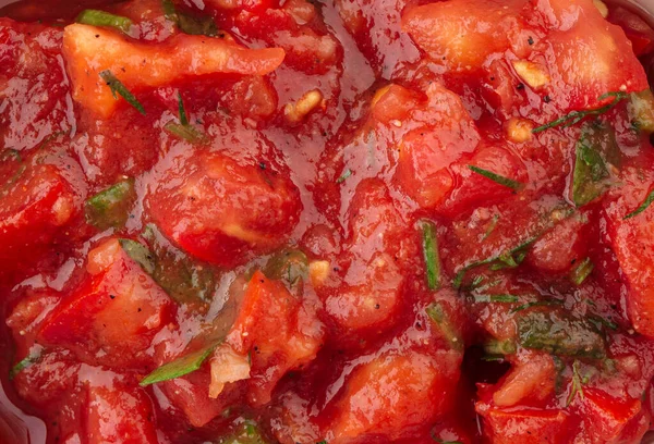 Closeup texture red tomato sauce with herbs — Stock Photo, Image