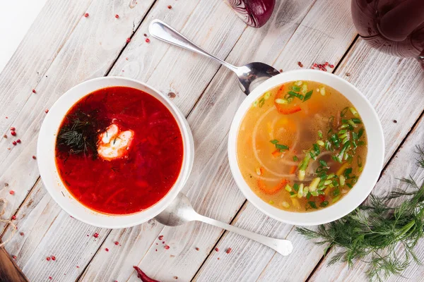 Top view on two soups borsch and vegetable — Stock Photo, Image