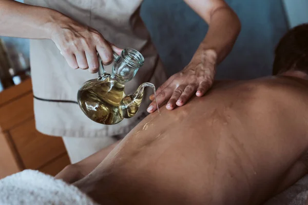 Man Having Back Massage Oil Hot Stones — Stock Photo, Image