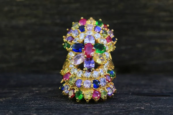 Gemstone rings are beautiful jewelry on old wooden floors.