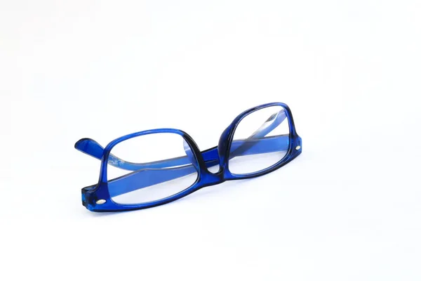 Close Óculos Azuis Fundo Branco — Fotografia de Stock