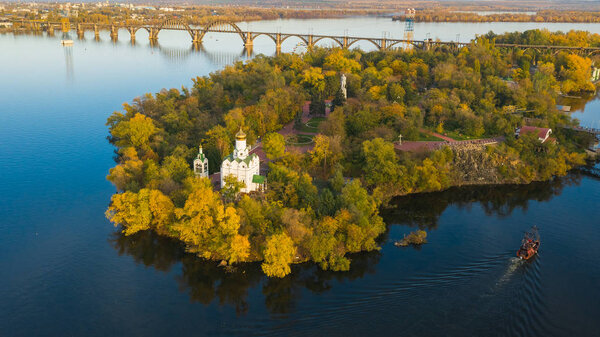 Autumn panoramic aerial view of Church on Monastic island on Dnieper river in Dnipro city. (Dnepr, Dnepropetrovsk, Dnipropetrovsk)