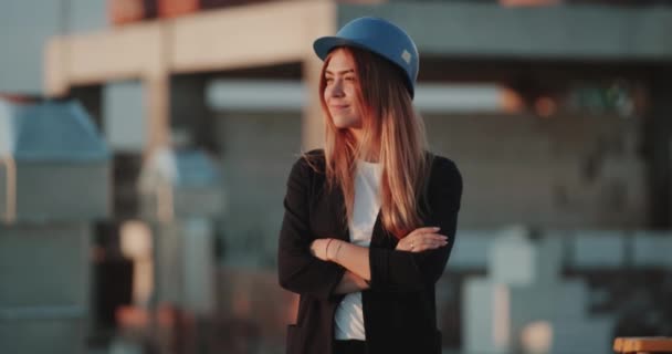 Smiling beautiful woman supervisor from construction site looking at camera. — Stock Video