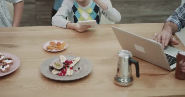 Closeup healthy lunch box mother giving to her two children to take them in the school for a lunch time. — Stock Video