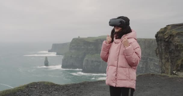 Young Lady Using Virtual Reality Glasseson Top Cliffs She Very — Stock Video