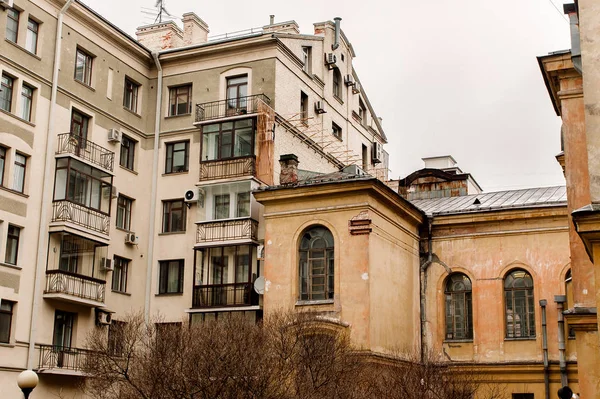 two houses of old and contemporary architecture in the downtown of Saint Petersburg