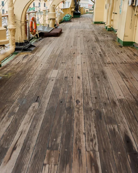 a wooden deck on an ice breaker ship