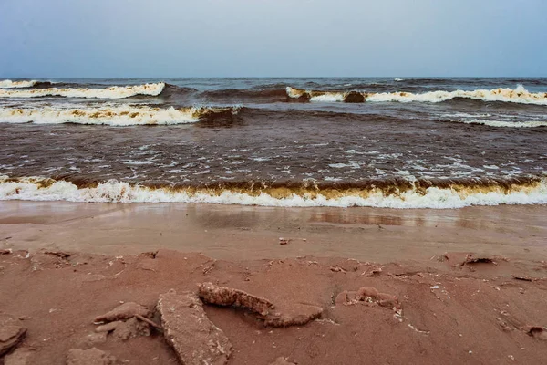 waves of cold water of a winter lake