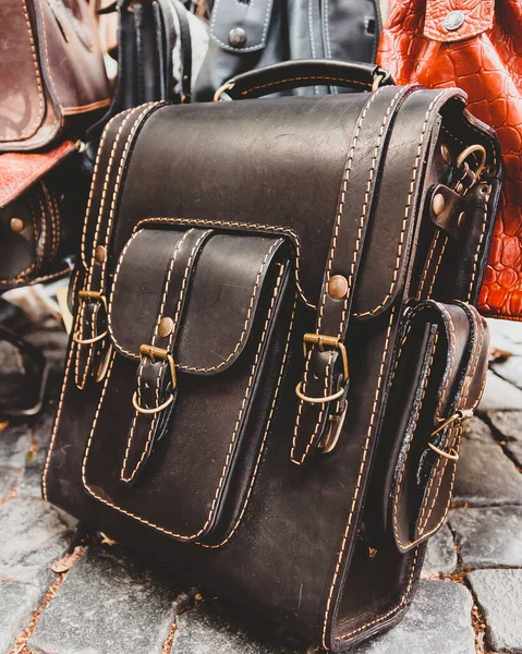 A brown leather travel backpack. Accessories for an active holiday in the style of steampunk