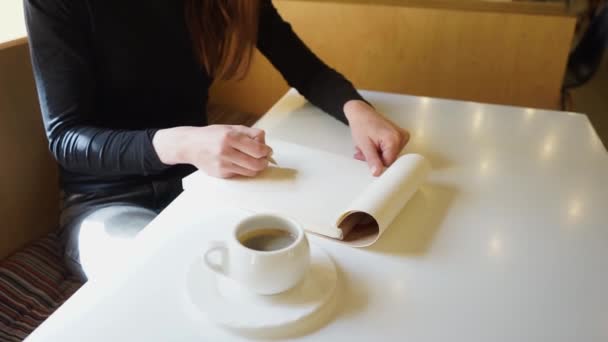 Hand Girl Draws Sketchbook Pencil Cafe Cup Coffee Table — Stock Video