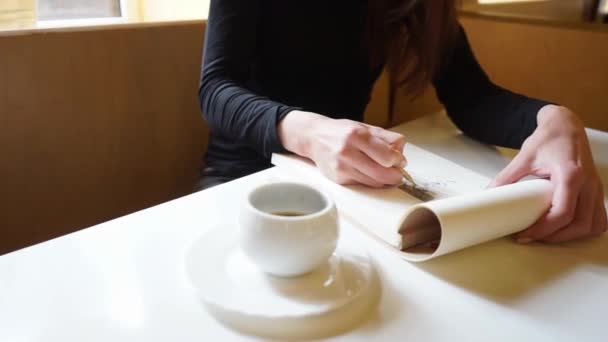 Hand Girl Draws Sketchbook Pencil Cafe Cup Coffee Table Slow — Stock Video