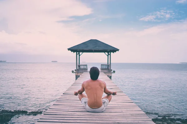 Young Man Lotus Pose Sitting Wooden Pier — Stock Photo, Image