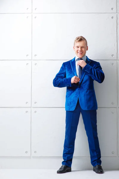 Portrait Happy Young Man Blue Suit Holding Hands Tie Looking — Stock Photo, Image