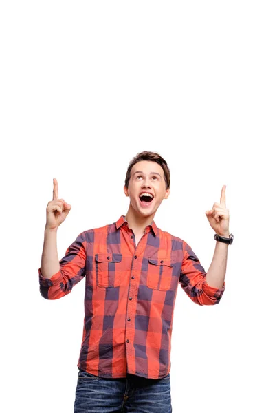 Studio Portrait Happy Handsome Young Man Pointing Copy Space — Stock Photo, Image