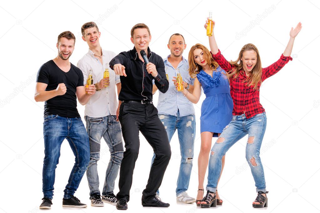 Group of happy smiling friends with bottles of beer having fun together