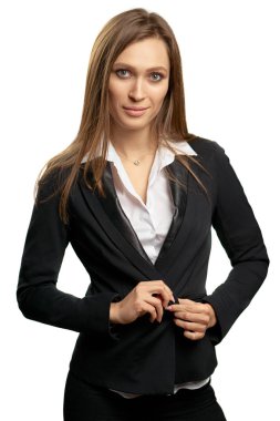 Beyaz arka plan üzerinde izole kamera bakarak takım elbiseli Genç iş kadını.