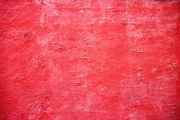 赤塗られた壁のクローズ アップ ビューのテクスチャ背景 — ストック写真